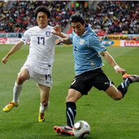 Uruguay/Ghana through to quarter finals